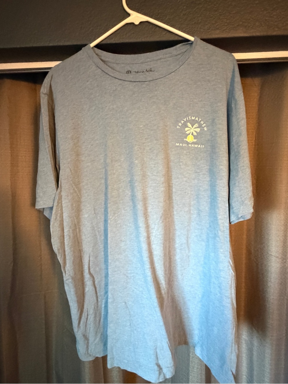 Travis Mathew Heather Sky Blue Short Sleeve Crew Tee with Palm Logo Maui Hawaii